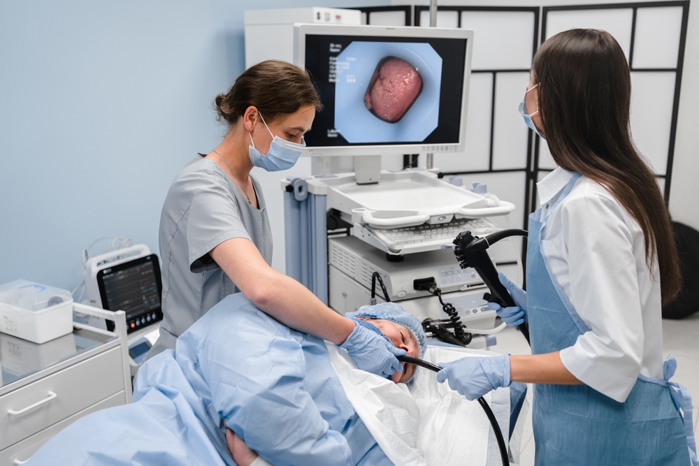 Woman getting a colonoscopy